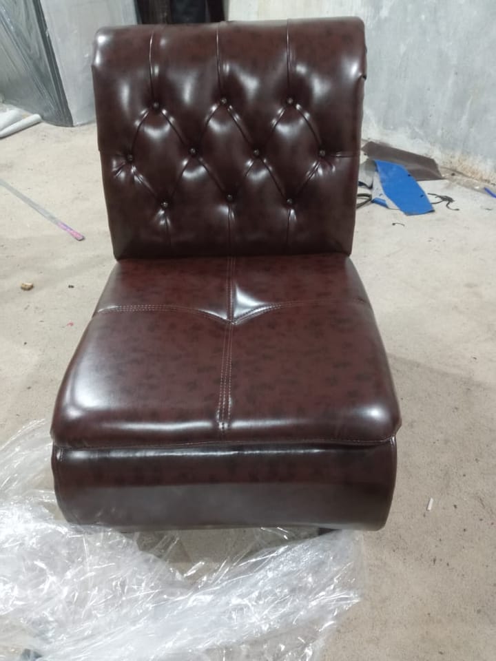 Brown Tufted Armless Chair — Visitor Chair