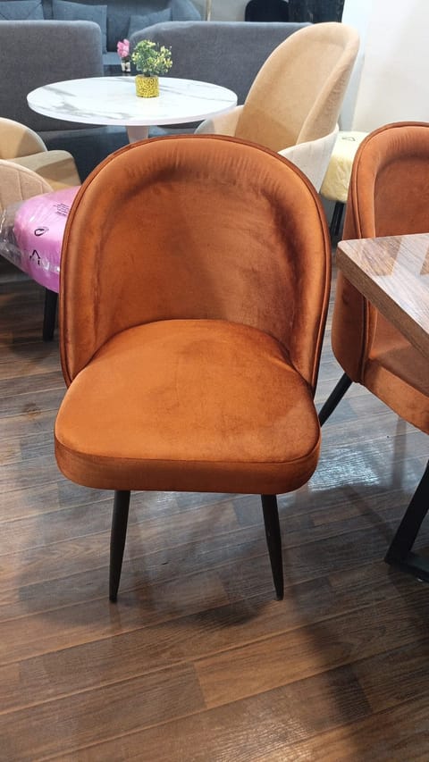 Rust Upholstered Dining Chair with Rounded Back